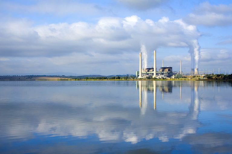 "Liddell and Bayswater Power Stations NSW Australia reflected in Lake Liddell, just after dawn"